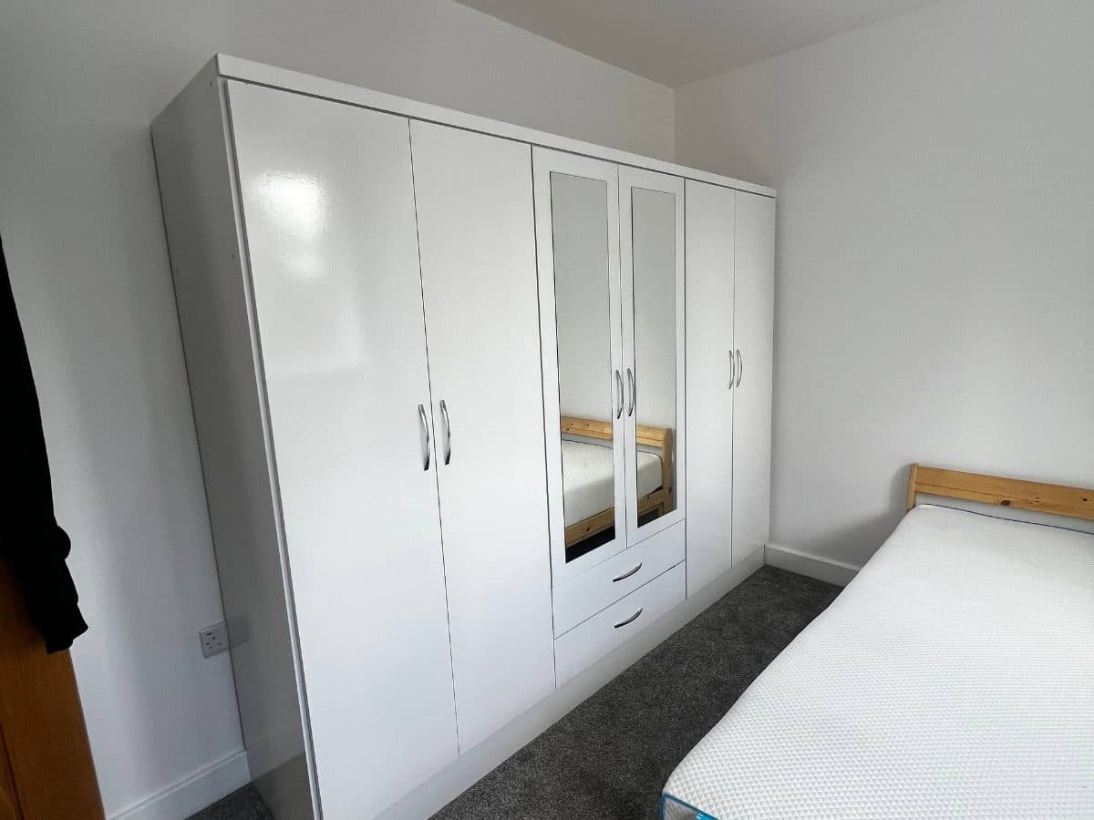 Six-Door Wardrobe and Wooden Bed Frame Furniture assembly project photo 1